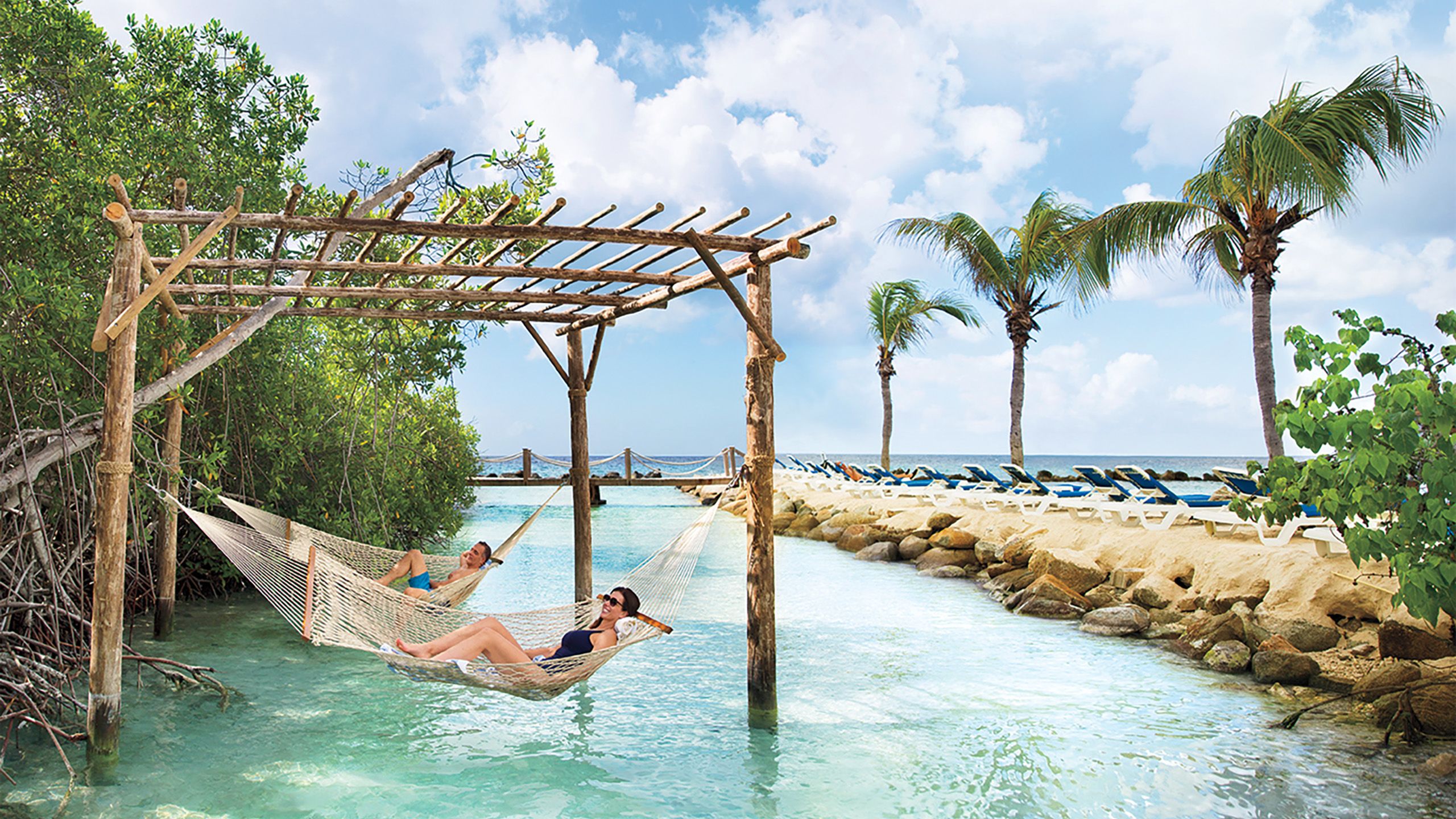 Woman on a hammock at an Aruba beach